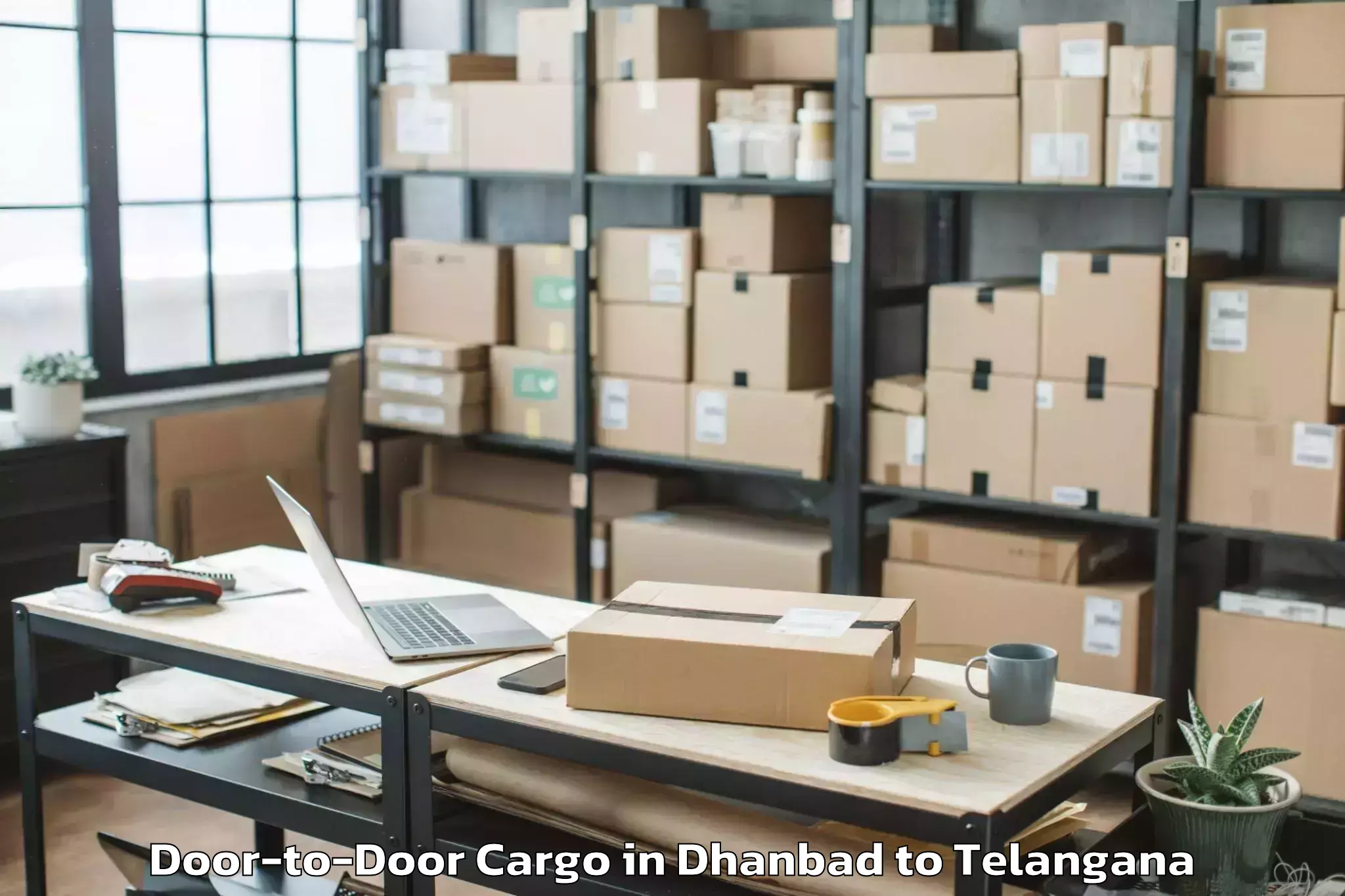 Professional Dhanbad to Timmapur Lmd Colony Door To Door Cargo